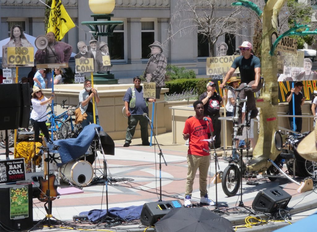 Nate Henderson, Oakland High School student and a fellow with the New Voices Are Rising Project of the Rose Foundation for Communities and the Environment, voicing a West Oakland community perspective, at NCIO rally, 2016-06-25. Photo: Steve Masover