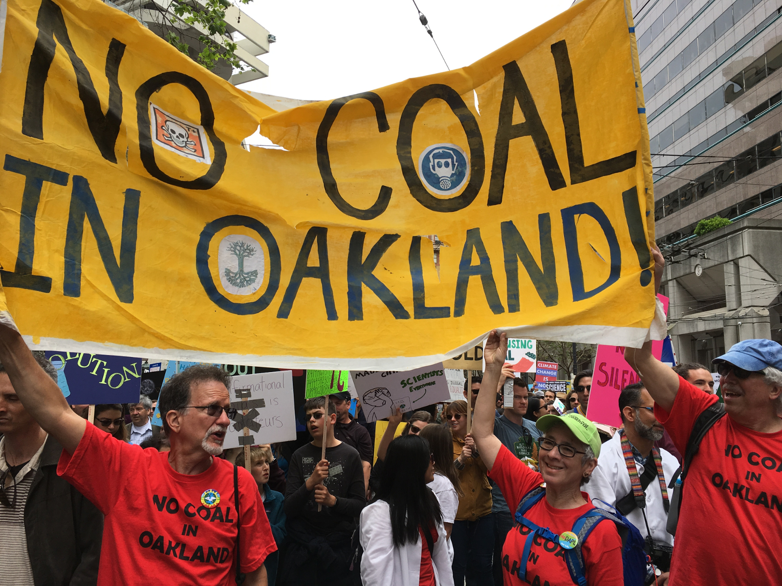 NCIO's banner among a sea of marchers on Market Street, San Francisco. 22 April 2017.