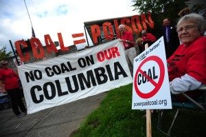 Protesters gather outside the Longview Coal Exports Hearing against the proposed Millennium Bulk Terminal which would export 44 million tons of coal annually to Asia