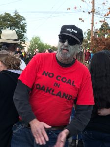A zombie spotted near Phil Tagami's house on October 30, 2017, wearing a No Coal in Oakland t-shirt. Photo credit: Kim White.