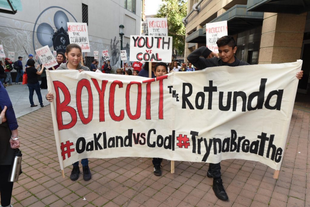 Youth march around Phil Tagami's Rotunda Building demanding the coal developer #DeCOALonize Oakland. Photo credit: Sunshine Velasco from Survival Media Agency