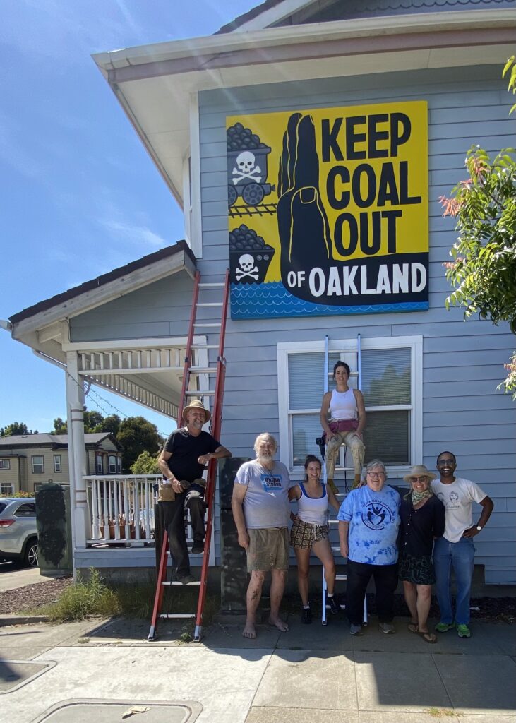 Keep Coal Out of Oakland banner mounted at 980 freeway exit.