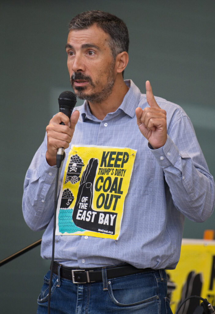 Labor speaker Cihan Tugal at Berkeley Rally, 2026-09-15. Photo Credit Leon Kunstenaar.