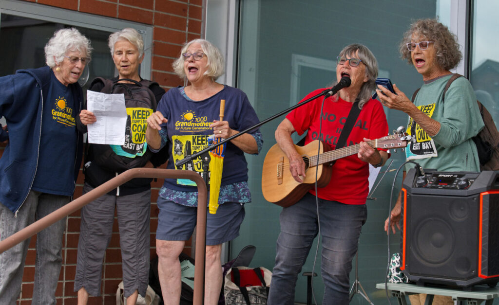 Singing Resistance at Berkeley Rally, 2026-09-15. Photo Credit Leon Kunstenaar.